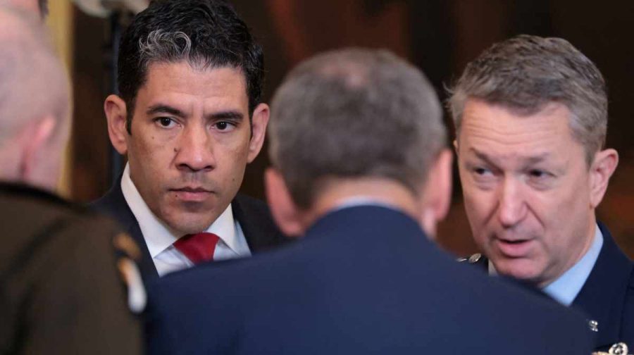 Senior Pentagon aide Ricky Buria stands with Chairman of the Joint Chiefs of Staff U.S. Air Force General Dan Caine and military leaders before a Medal of Honor ceremony at the White House in Washington, D.C., U.S., March 2, 2026. REUTERS/Jonathan Ernst