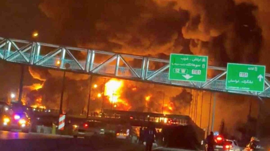 Fire burns and smoke rises from Aqdasiyeh Oil Depot after being reportedly hit by strike, amid the U.S.-Israeli conflict with Iran, in Tehran, Iran in this screengrab taken from a social media video released on March 8, 2026. SOCIAL MEDIA/via REUTERS THIS IMAGE HAS BEEN SUPPLIED BY A THIRD PARTY. NO RESALES. NO ARCHIVES. VERIFICATION: Reuters confirmed the location as Tehran by the road layout, utility poles and trees which match file and satellite imagery. The date of the video could not be verified, but no older version was found posted online before March 8. Israeli military also wrote on Telegram that it had struck a number of fuel storage facilities in Tehran on March 8. Iran’s state agencies reported attacks on a number of oil depots on March 7. NASA FIRMS detected thermal activity on coordinate 35.790649529257415, 51.539333520742645 at 1:50 a.m. on March 8 (10:20 p.m. UTC March 7). The coordinates were tagged as Petrol Storage Aqdasieh on the online map.