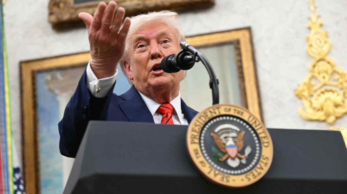 US President Donald Trump announces a deal to lower drug prices with drug maker AstraZeneca at the Oval Office of the White House in Washington, DC, on October 10, 2025. (Photo by SAUL LOEB / AFP)