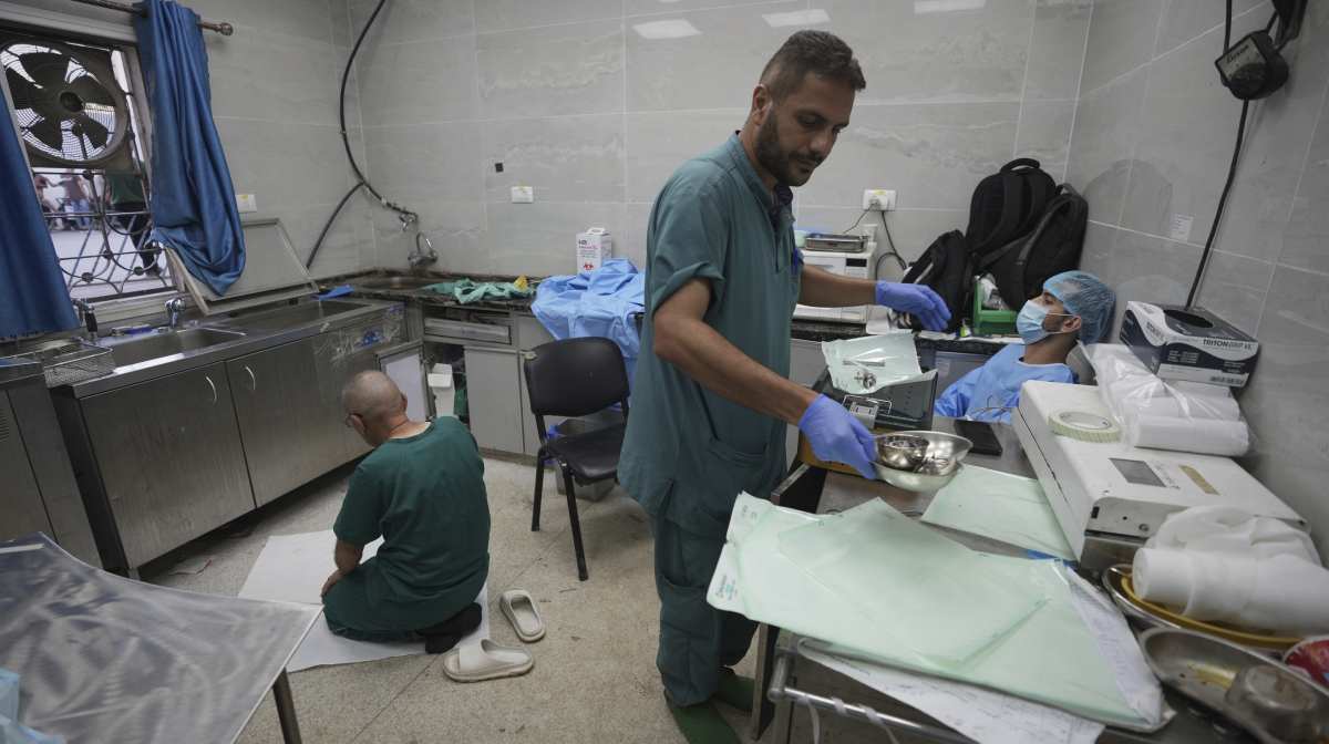

A medical staff member prays in a room designated for sterilizing surgical tools, which also serves as a rest and prayer space for doctors and staff, at Shifa Hospital in Gaza City, Friday, July 4, 2025. (AP Photo/Jehad Alshrafi)



