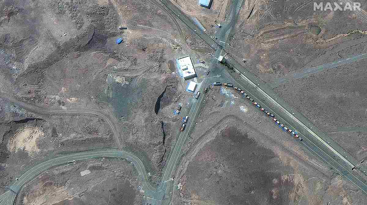 This handout satellite picture provided by Maxar Technologies and taken on June 19, 2025, shows trucks positioned near the entrance of Iran's Fordow Fuel Enrichment Plant (FFEP), northeast of the city of Qom. President Donald Trump said US air strikes early on June 22 "totally obliterated" Iran's main nuclear sites, as Washington joined Israel's war with Tehran in a flashpoint moment for the Middle East. (Photo by Satellite image Â©2025 Maxar Technologies / AFP) / RESTRICTED TO EDITORIAL USE - MANDATORY CREDIT "AFP PHOTO/ SATELLITE IMAGE Â©2025 MAXAR TECHNOLOGIES" - NO MARKETING NO ADVERTISING CAMPAIGNS - DISTRIBUTED AS A SERVICE TO CLIENTS - THE WATERMARK MAY NOT BE REMOVED/CROPPED