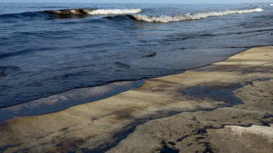 Oil washes up along a beach in Umm Al Quwain, United Arab Emirates, Saturday, Oct. 24, 2026. (UGC via AP)