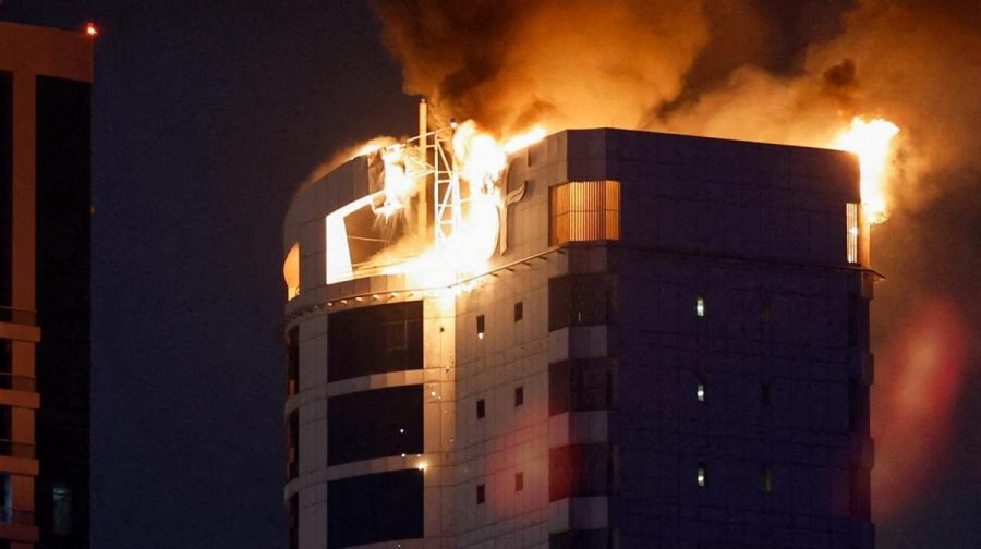 Smoke rises from a burning building hit by an Iranian drone strike, after Israel and the U.S. launched strikes on Iran, in Seef district, Manama, Bahrain, February 28, 2026. REUTERS/Hamad I Mohammed     TPX IMAGES OF THE DAY     