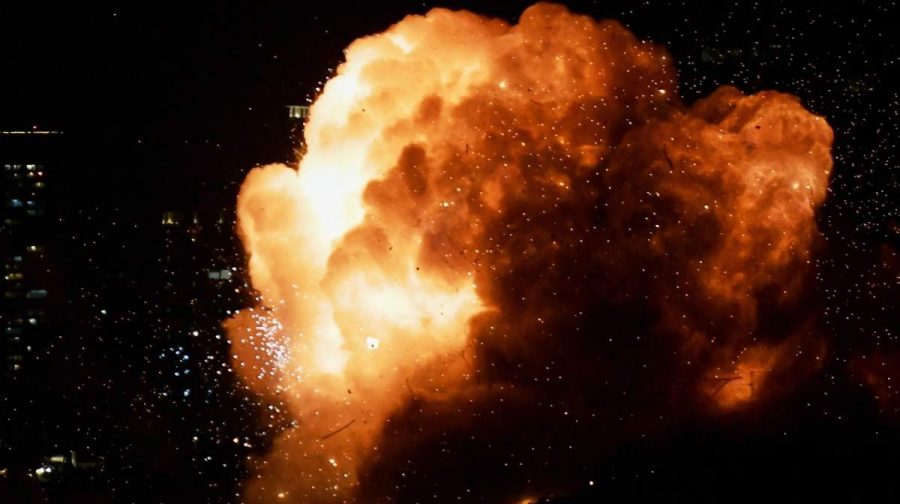 An explosion is seen as an Iranian missile directly hits a building in Tel Aviv, Israel, Saturday, Feb. 28, 2026. (AP Photo/Tomer Neuberg)