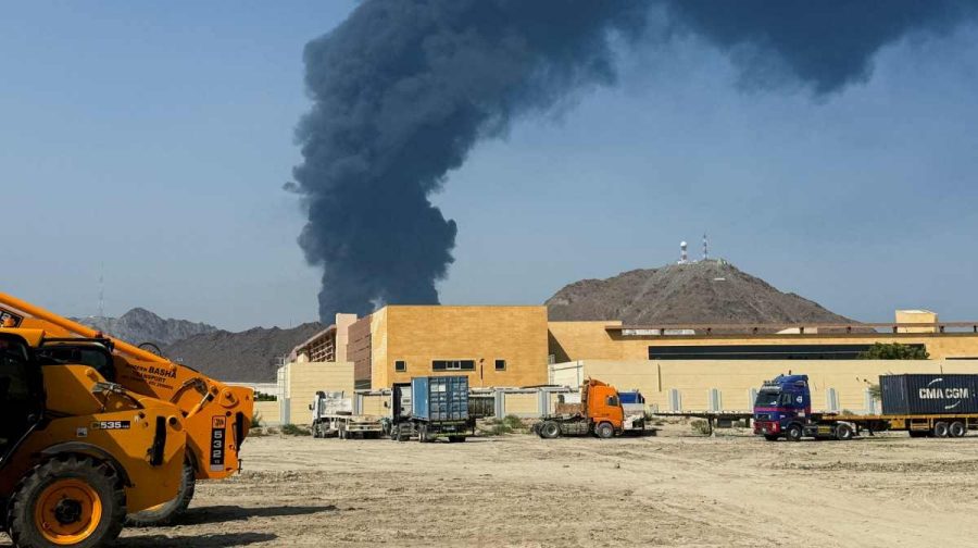 Smoke rises in the Fujairah oil industry zone, caused by debris after interception of a drone by air defenses, according to the Fujairah media office, amid the U.S.-Israel conflict with Iran, in Fujairah, United Arab Emirates, March 14, 2026. Picture taken with a mobile phone. REUTERS/Staff/File Photo