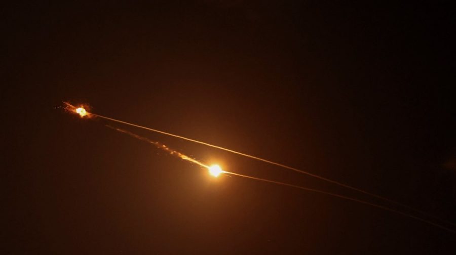 Streaks of light illuminate the sky during an interception attempt amid the U.S.-Israeli conflict with Iran, as seen from Tel Aviv, Israel March 15, 2026. REUTERS/Tyrone Siu     TPX IMAGES OF THE DAY     