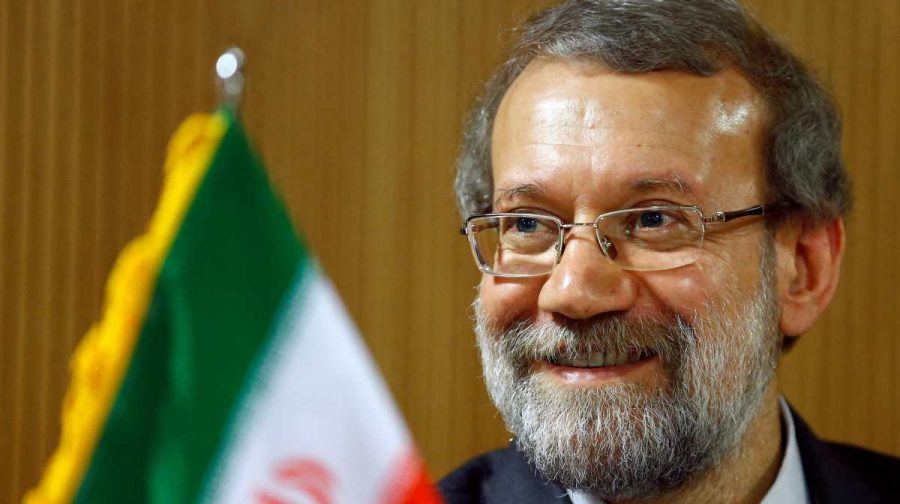 FILE PHOTO: Ali Larijani, Speaker of the Iranian Parliament, smiles during a news conference after the 129th Assembly of the Inter-Parliamentary Union in Geneva, Switzerland October 9, 2013.  REUTERS/Denis Balibouse/File Photo