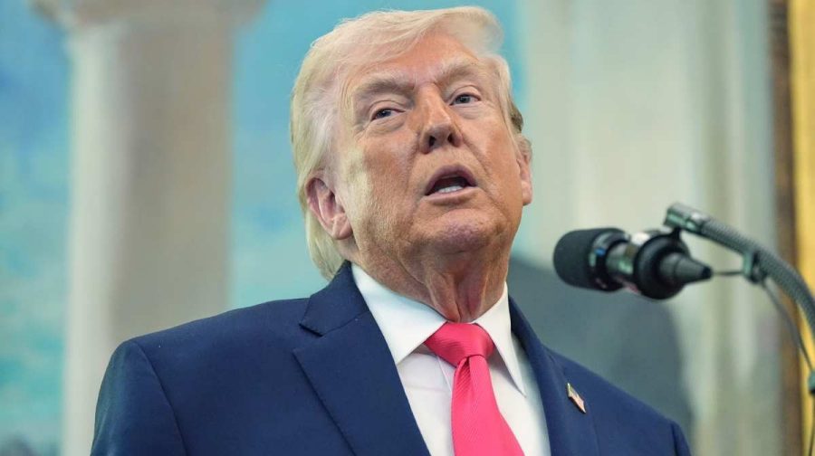 President Donald Trump speaks during the swearing in for Homeland Security Secretary Markwayne Mullin in the Oval Office of the White House, Tuesday, March 24, 2026, in Washington. (AP Photo/Alex Brandon)(AP03_25_2026_000005B)