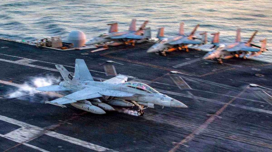  F/A-18F Super Hornet, attached to Strike Fighter Squadron (VFA) 41, making an arrested landing on the flight deck of Nimitz-class aircraft carrier USS Abraham Lincoln (CVN 72) in support of Operation Epic Fury on February 28, 2026