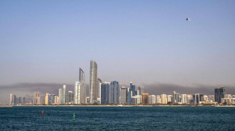 A plume of smoke rises from the Zayed Port following a reported Iranian strike in Abu Dhabi on March 1, 2026. Iran's retaliatory missile and drone campaign in the Gulf has killed three people and wounded 58 in the United Arab Emirates since it began, Emirati authorities said on March 1, the day after the US and Israel launched a nationwaide attack on Iran killing its supreme leader. (Photo by Ryan Lim / AFP)