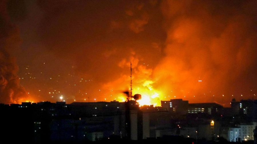 TOPSHOT - Smoke and fire rise from the site of airstrikes at Mehrabad International Airport in Tehran on March 7, 2026. Israel said on March 7 it had launched "broad-scale" strikes on targets in Tehran, as the Iranian state broadcaster reported an explosion in the western part of the city. (Photo by ATTA KENARE / AFP)