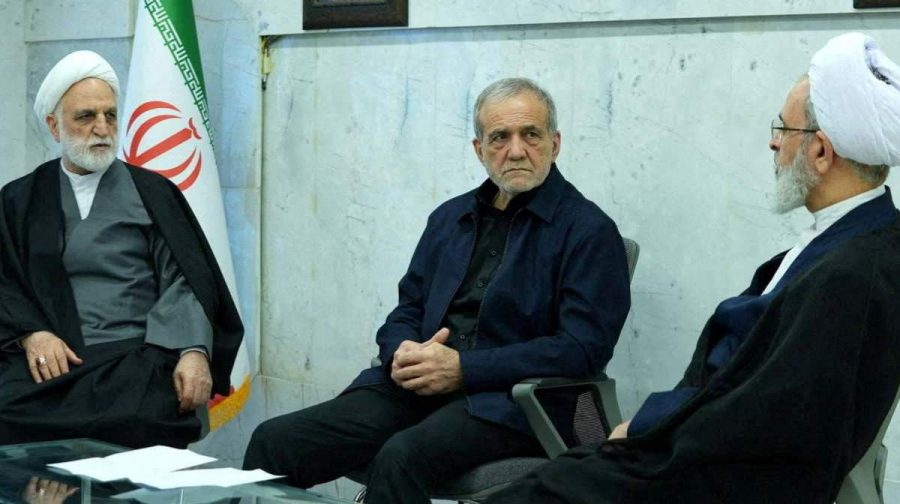 Iranian President Masoud Pezeshkian, Gholam-Hossein Mohseni-Eje'i, the head of the judiciary and Alireza Arafi, deputy chairman of the Assembly of Experts, attend the meeting of the interim leadership council of Iran in an unknown location, amid the U.S.-Israel conflict with Iran, in Iran, March 1, 2026. IRIB/WANA (West Asia News Agency)/Handout via REUTERS ATTENTION EDITORS - THIS PICTURE WAS PROVIDED BY A THIRD PARTY    REFILE - ADDED CONTEXT    TPX IMAGES OF THE DAY     