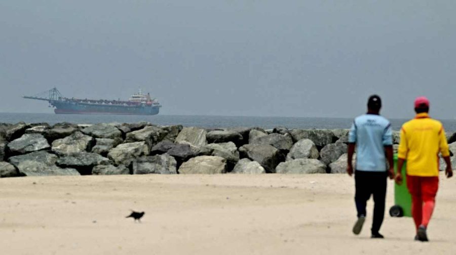 A ship is seen in the Persian Gulf off the coast of Sharjah the day after the failure of US-Iran peace talks on April 13, 2026. The failure of US-Iran peace talks has left the US President with several unpalatable options, as analysts say his order to blockade the strategic Strait of Hormuz could further complicate his next move on April 12, 2026. Any hopes that US Vice President would emerge from the marathon day of negotiations with top Iranian officials with a deal to end a war that has rippled across the Middle East were dashed when he left hosts Pakistan emptyhanded. (Photo by AFP)