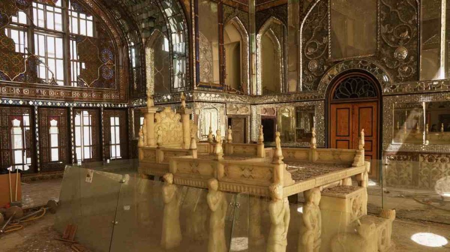 Broken glass lies on the floor in a room damaged, according to Iranian authorities, by a nearby airstrike during U.S.-Israeli strikes in early March at the Golestan Palace, a UNESCO World Heritage site, in Tehran, Iran, Sunday, April 5, 2026. (AP Photo/Francisco Seco)