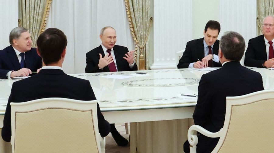 Russian President Vladimir Putin, second left, Russian Presidential foreign policy adviser Yuri Ushakov, left, and Russian Direct Investment Fund CEO Special Presidential Representative for Investment and Economic Cooperation with Foreign Countries Kirill Dmitriev, right, attend talks with U.S. special envoy Steve Witkoff, right back to a camera, and Jared Kushner, U.S. President Donald Trump's son-in-law, left back to a camera, at the Senate Palace of the Kremlin in Moscow, Russia, Tuesday, Dec. 2, 2025. (Alexander Kazakov, Sputnik, Kremlin Pool Photo via AP)