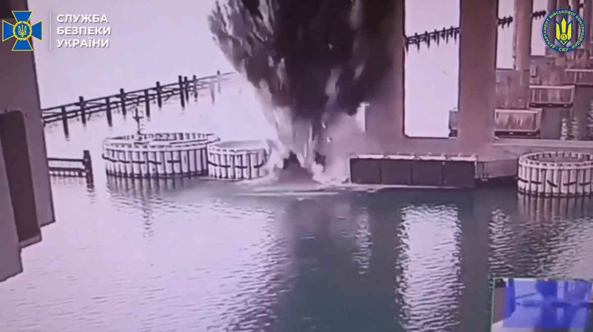 TOPSHOT - This video grab taken from a handout footage released by the Ukrainian Security Service on June 3, 2025, allegedly shows the explosion of the Kerch Bridge connecting Crimea with Russia following a special operation carried out by the Ukrainian Security Service, amid the ongoing Russian-Ukrainian conflict. (Photo by Handout / UKRAINIAN SECURITY SERVICE / AFP) / RESTRICTED TO EDITORIAL USE - MANDATORY CREDIT "AFP PHOTO / UKRAINIAN SECURITY SERVICE" - NO MARKETING NO ADVERTISING CAMPAIGNS - DISTRIBUTED AS A SERVICE TO CLIENTS - AFP CANNOT INDEPENDENTLY VERIFY THE AUTHENTICITY OR LOCATION, DATE, AND CONTENT OF THESE IMAGES. / 
