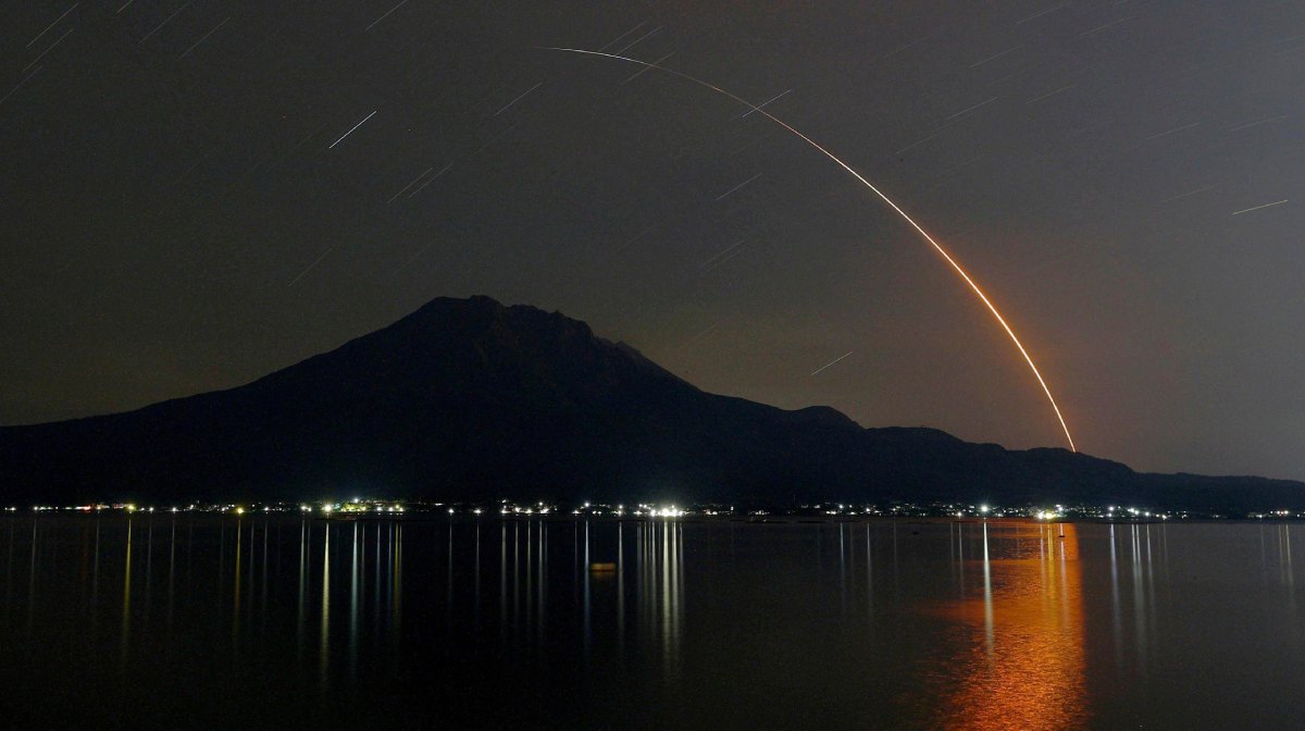 In this long exposure photo, an H-2A rocket carrying Global Observing SATellite for Greenhouse gases and Water cycle, or GOSAT-GW satellite, lifts off from Tanegashima Space Center, seen in Kagoshima, southern Japan, early Sunday, June 29, 2025. (Kotaro Ueda/Kyodo News via AP)
