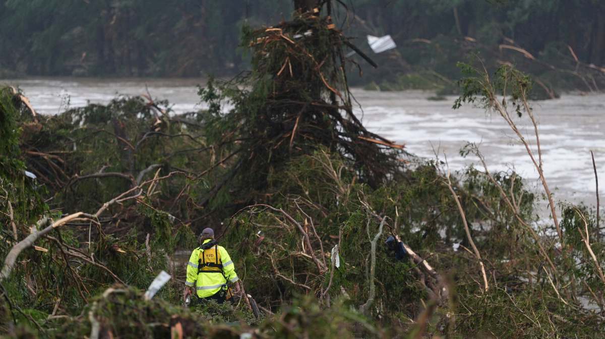 A first responder searches an area along the Guadalupe River that hit by flash flooding, Friday, July 4, 2025, in Kerrville, Texas. AP/PTI(AP07_05_2025_000069A)