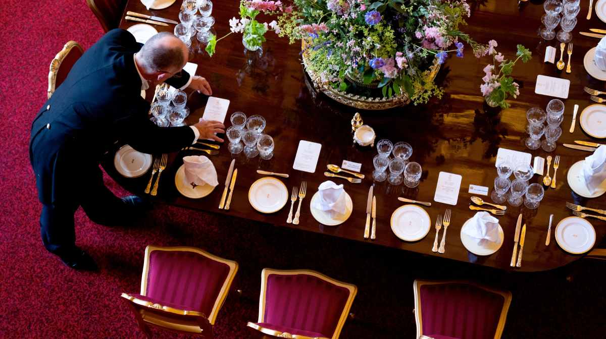 Adjustments are made to table decorations for the State Banquet for President of France Emmanuel Macron and his wife Brigitte Macron, on day one of the French President's state visit to the UK, at Windsor Castle, Berkshire, Britain, July 8, 2025. Aaron Chown/Pool via REUTERS