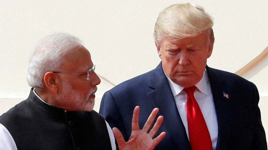 FILE PHOTO: FILE PHOTO: U.S. President Donald Trump and India's Prime Minister Narendra Modi talk as they arrive for a joint news conference after bilateral talks at Hyderabad House in New Delhi, India, February 25, 2020. REUTERS/Al Drago//File Photo