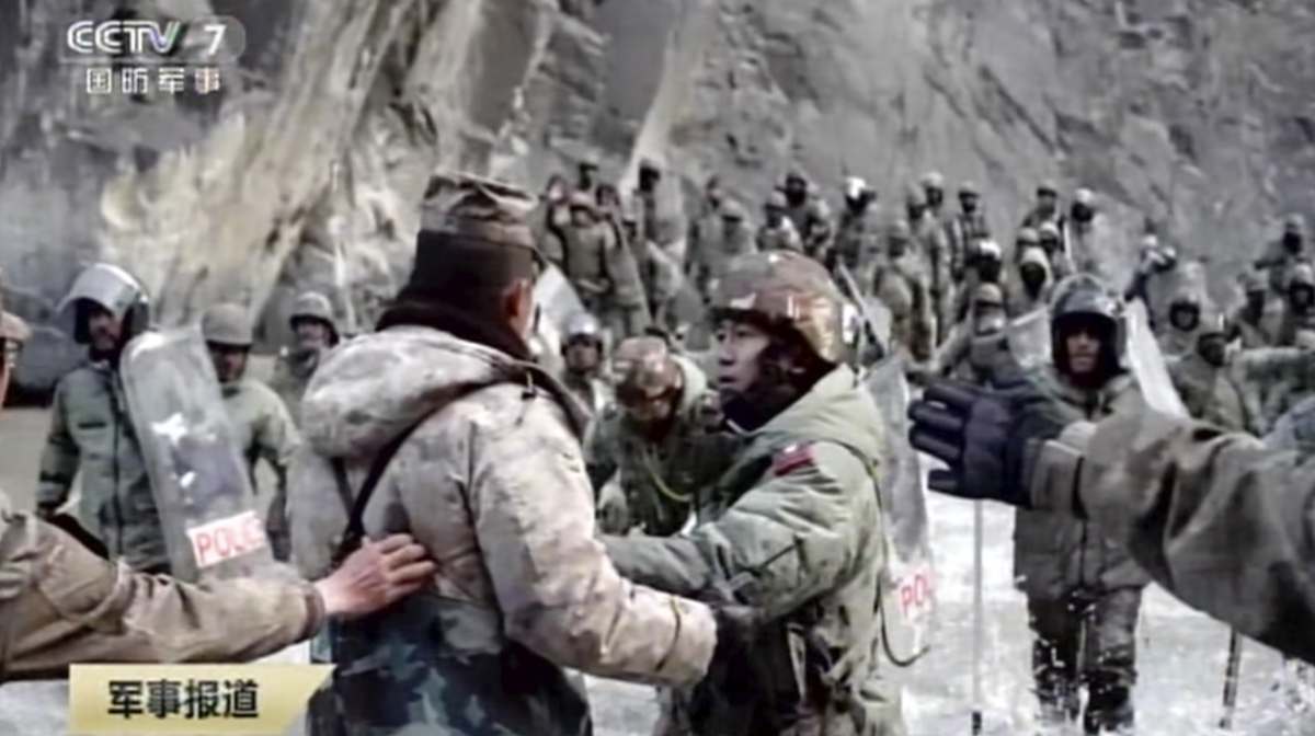 In this image taken from video footage run Feb. 19, 2021 by China's CCTV via AP Video, Indian and Chinese troops face off in the Galwan Valley on the disputed border between China and India, June 15, 2020. China's military said Friday, Feb. 19, 2021 that four of its soldiers were killed in a high-mountain border clash with Indian forces last year, the first time Beijing has publicly conceded its side suffered casualties in the deadliest incident between the Asian giants in nearly 45 years. (CCTV via AP Video)