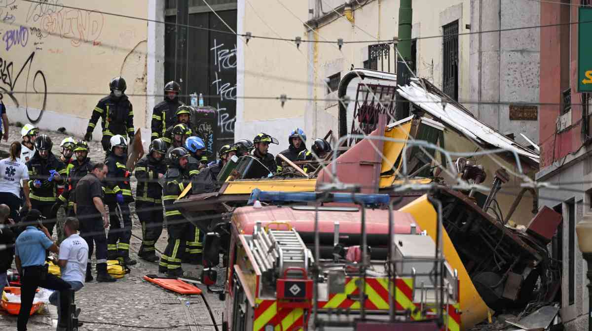First responders work at the site of an accident involving Lisbon's Gloria funicular, a popular tourist attraction, which derailed and crashed, resulting in fatalities and injuries, according to authorities, in Lisbon, Portugal, September 3, 2025. REUTERS/Stringer