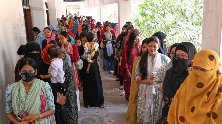 Women queue up to cast their vote at a polling station during Bangladesh's national parliamentary election, in Dhaka, Bangladesh, Thursday, Feb. 12, 2026. (AP Photo/Mahmud Hossain Opu)