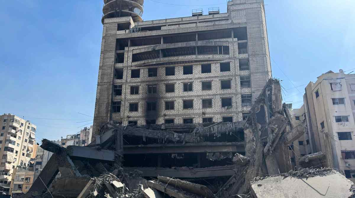 The heavily damaged building of the Lebanese Shiite movement Hezbollah s television station al-Manar, which was hit by overnight Israeli strikes, is pictured in the southern suburbs of Beirut on March 3, 2026. The war launched by the United States and Israel against Iran spread across the Middle East, threatening to plunge the global economy into chaos, with Lebanon and Gulf energy exporters dragged into the conflict. (Photo by AFP stringer / AFP)
