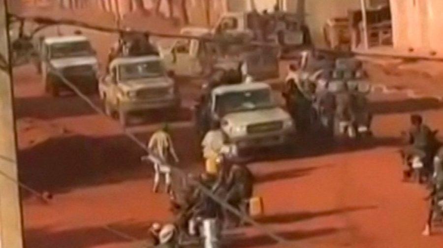 TOPSHOT - This video grab taken from UGC images verified by AFP on April 25, 2026 show armed jihadists moving through the streets of Kati, the hometown of military ruler General Assimi Goita, as gunfire echoes across several cities of Mali. AFP has authenticated the footage through geolocation of key sites. Some details, including locations in Sevare, have been withheld for security reasons. (Photo by anonymous / UGC / AFP) / RESTRICTED TO EDITORIAL USE - MANDATORY CREDIT "AFP PHOTO /   UGC / ANONYMOUS USER " - NO MARKETING NO ADVERTISING CAMPAIGNS - DISTRIBUTED AS A SERVICE TO CLIENTS