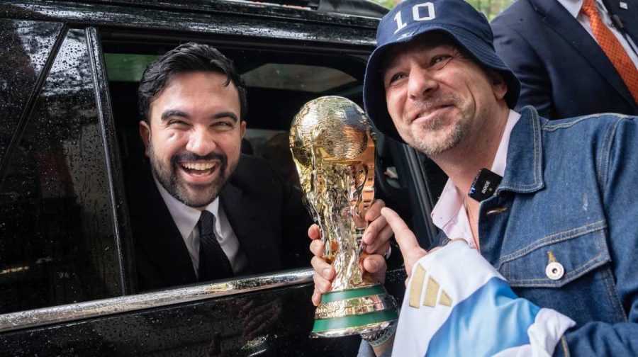 New York Mayor Zohran Mamdani poses with a World Cup Trophy alongside Ezequiel Cecchi, 49, after making a World Cup soccer tournament announcement at Harlem Tavern, Thursday, May 21, 2026 in New York. (AP Photo/Adam Gray)