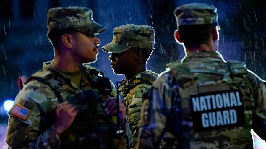 Members of the National Guard gather near the White House after a shooting incident in Washington, D.C., U.S., May 23, 2026. REUTERS/Nathan Howard