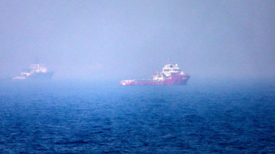 This picture shows ships sailing near the Strait of Hormuz off the eastern coast of the United Arab Emirates at Khor Fakkan on July 13, 2026. The United States is "taking over" the Strait of Hormuz and will be paid for protecting it, US President Donald Trump declared on July 13, as Washington and Tehran once again fought over the vital waterway. (Photo by AFP)