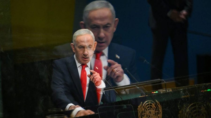This photograph made using a lens teleconverter set to its mid-range position causing an image refraction shows Israel's Prime Minister Benjamin Netanyahu speaking during the 81st United Nations General Assembly at the United Nations Headquarters in New York, on September 24, 2026. (Photo by ANGELA WEISS / AFP)