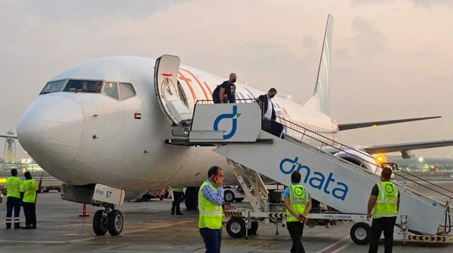 FILE - Israeli tourists leave a FlyDubai plane which departed from Ben-Gurion International Airport in Tel Aviv and landed in Dubai, United Arab Emirates, Nov. 8, 2020.(AP Photo/Malak Harb, File)