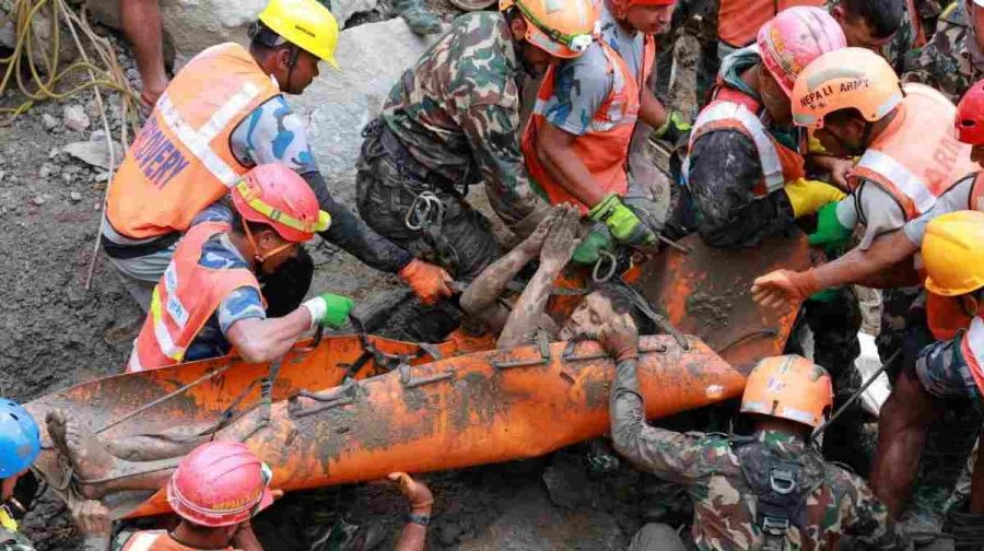 A survivor is carried by members of a search and rescue team after they rescued two people alive who had been trapped inside a tunnel at the Trishuli-3A Hydropower Project following devastating floods and mudslides that struck the Bhotekoshi River in Rasuwa, Nepal, September 4, 2026. Nepal Army/Handout via REUTERS. THIS IMAGE HAS BEEN SUPPLIED BY A THIRD PARTY. MANDATORY CREDIT. NO RESALES. NO ARCHIVES. 