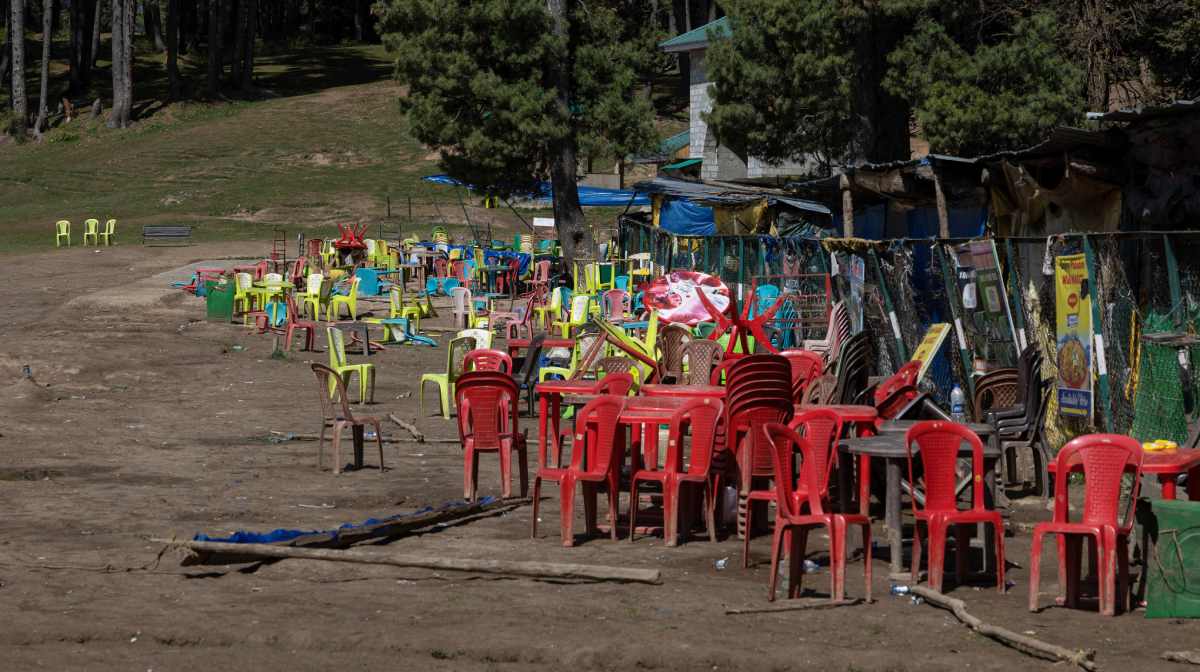 Chairs and tables are scattered at the site of a suspected militant attack on tourists in Baisaran near Pahalgam in south Kashmir's Anantnag district, April 24, 2025. REUTERS/Adnan Abidi