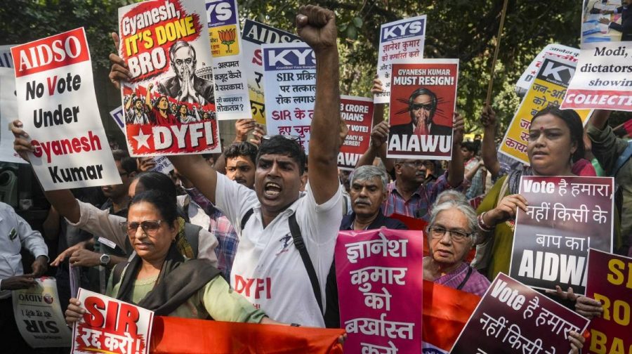  People under the banner of various organisations hold placards as they stage a protest against the alleged deletion of voters and Special Intensive Revision (SIR) electoral rolls, in New Delhi, Friday, Oct. 23, 2026. (PTI Photo/Karma Bhutia)