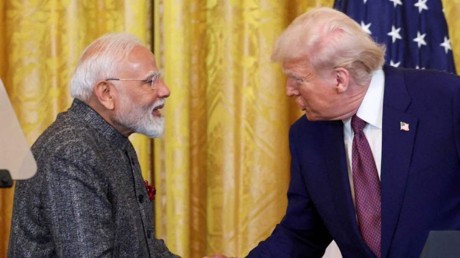 FILE PHOTO: U.S. President Donald Trump and Indian Prime Minister Narendra Modi shake hands as they attend a joint press conference at the White House in Washington, D.C., U.S., February 13, 2025. REUTERS/Kevin Lamarque/File Photo/File Photo