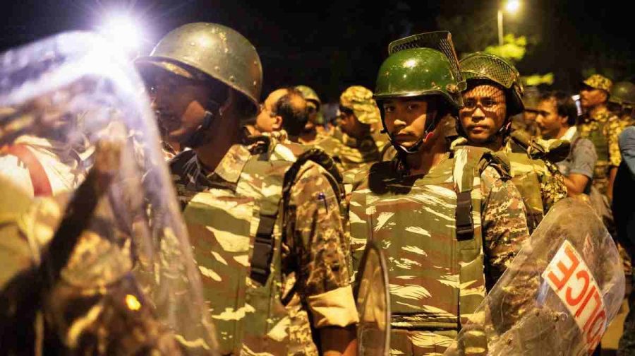 Policemen stand guard during the ongoing protest of Cockroach Janata Party (CJP), two days after thousands of protesters marched towards parliament demanding the resignation of Education Minister Dharmendra Pradhan over examination paper leaks, at Jantar Mantar in New Delhi, India, July 22, 2026. REUTERS/Adnan Abidi