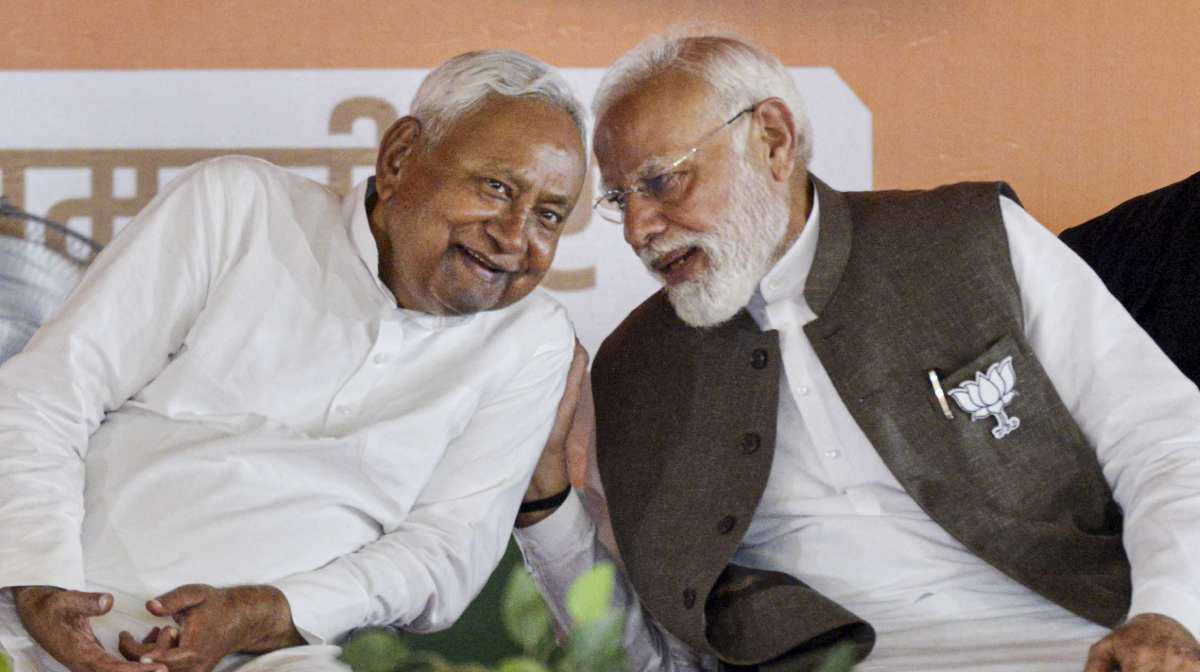 Samastipur: Prime Minister Narendra Modi, right, and Bihar Chief Minister Nitish Kumar during a public meeting ahead of the state Assembly elections, in Samastipur district, Friday, Oct. 24, 2025. (PTI Photo) (PTI10_24_2025_000087A)