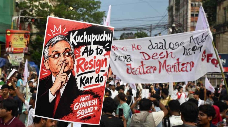 Student activists aligned with left-wing organisations hold a poster of India's Chief Election Commissioner Gyanesh Kumar amid the ongoing protest in solidarity with the youth-led Cockroach Janata Party (CJP) demanding his resignation over alleged voter roll irregularities linked to the "special intensive revision" (SIR), in Kolkata on October 11, 2026. (Photo by Dibyangshu SARKAR / AFP)