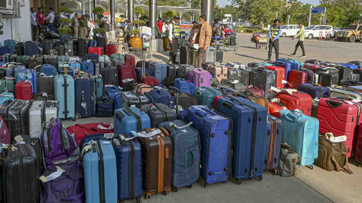 Ahmedabad: Checked-in luggage of stranded passengers kept outside Sardar Vallabhbhai Patel International Airport amid IndiGo flight disruptions, in Ahmedabad, Friday, Dec. 5, 2025. (PTI Photo)(PTI12_05_2025_000412B)