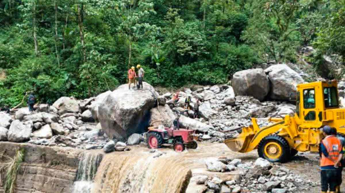 Sikkim: Border Roads Organisation (BRO) personnel clear debris from a road following landslides triggered by heavy rainfall, in North Sikkim. (PTI Photo)(PTI06_01_2025_000607B)