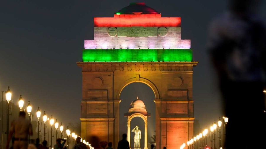 New Delhi: Visitors walk down the Kartavya Path overlooking the illuminated India Gate on the eve of the 80th Independence Day, in New Delhi, Friday, Aug. 14, 2026. (PTI Photo/Ravi Choudhary) (PTI08_14_2026_000386A)