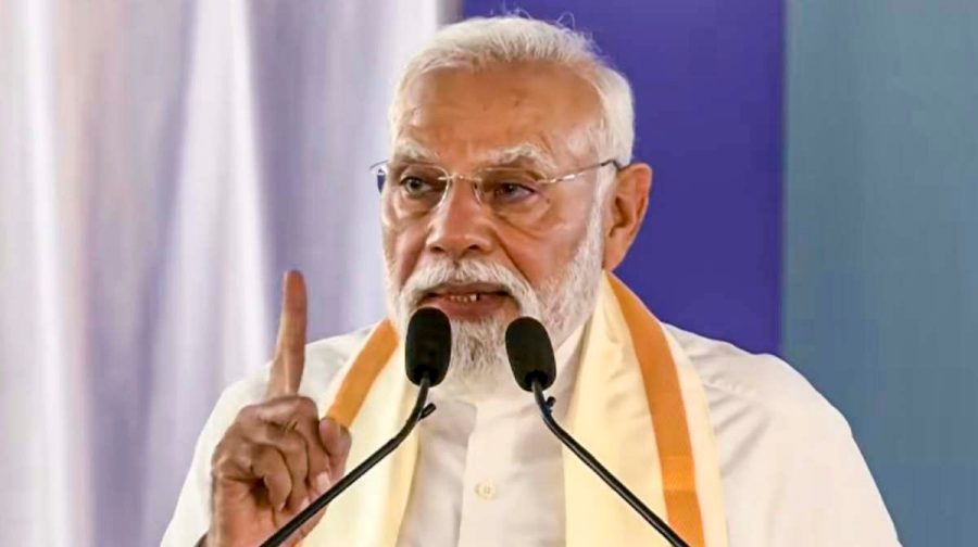**EDS: THIRD PARTY IMAGE** In this screengrab from a video posted on March 11, 2026, Prime Minister Narendra Modi addresses the gathering during the Golden Jubilee Sammelan of Akhila Kerala Dheevara Sabha, in Kochi, Kerala. (@NarendraModi/YT via PTI Photo)(PTI03_11_2026_000108B)