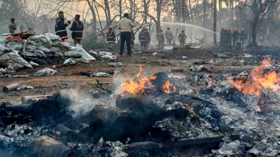 Thrissur: Firefighters douse a blaze after a fire broke out at a fireworks manufacturing unit at Mundathikode village, in Thrissur district, Tuesday, April 21, 2026. (PTI Photo)(PTI04_21_2026_000375B)