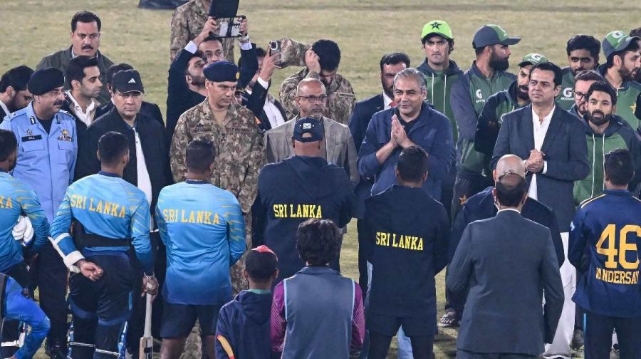 Pakistan's Cricket Board Chairman Mohsin Naqvi (centre R) gestures while speaking with Sri Lankas players at the Rawalpindi Cricket Stadium in Rawalpindi on November 13, 2025,