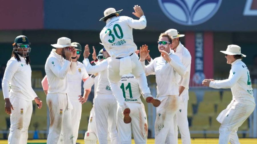 South Africa's players celebrate the dismissal of India's Washington Sundar on the fifth day of the second cricket test match between India and South Africa in Guwahati, India, Saturday, Nov. 22, 2025. (AP Photo/Anupam Nath)