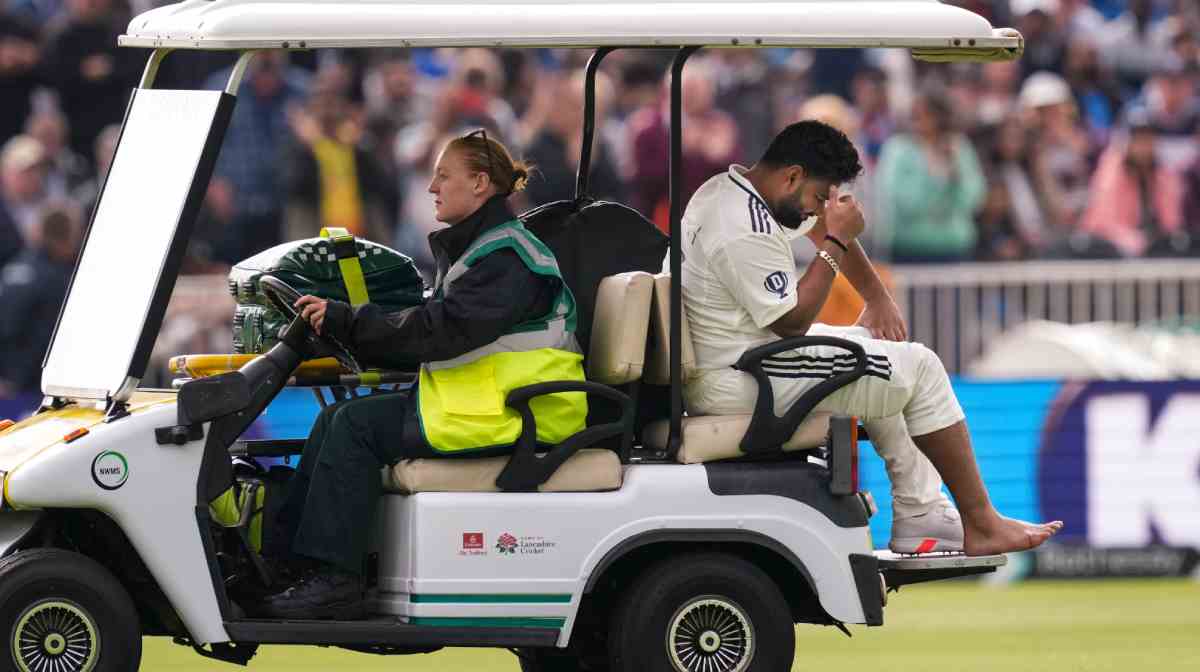 Manchester: India's Rishabh Pant grimaces in pain as he is being taken off field after an injury on day one of the fourth test cricket match between India and England, at the Old Trafford Cricket Ground, in Manchester, Wednesday, July 23, 2025. (PTI Photo/R Senthilkumar) (PTI07_23_2025_000590A)