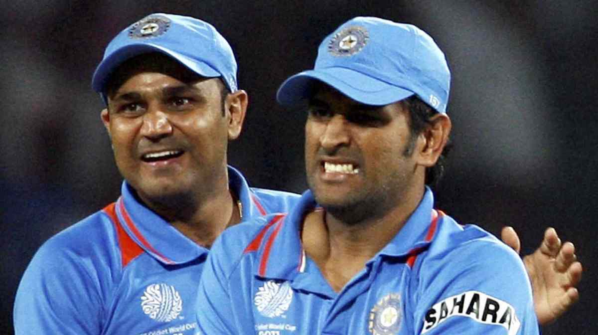 Nagpur : Indian  players Virendra Sehwag and M.S.Dhoni celebrate the run out of Jacques Kallis during their World Cup match in Nagpur on Saturday. PTI Photo by Shashank Parade(PTI3_12_2011_000254B)